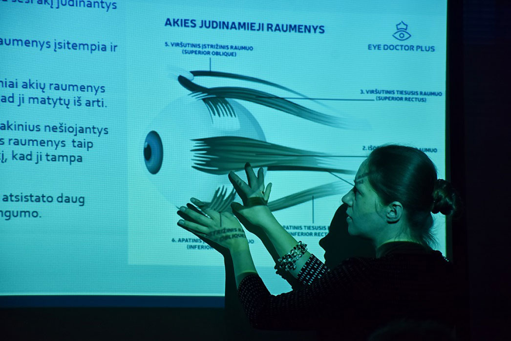 Sigita giving a lecture showing the anatomy of the eye